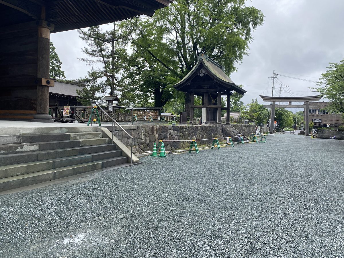 Looking back along the entrance path at Aso Shrine