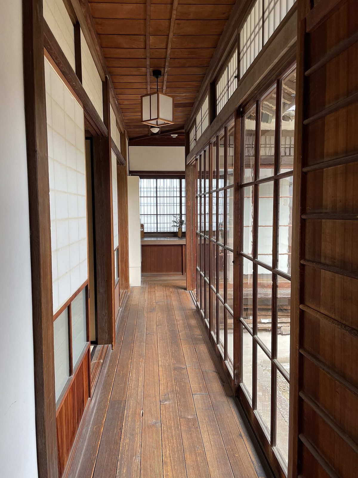 Interior corridor of the Hitotsumatsu samurai villa showing traditional tatami rooms