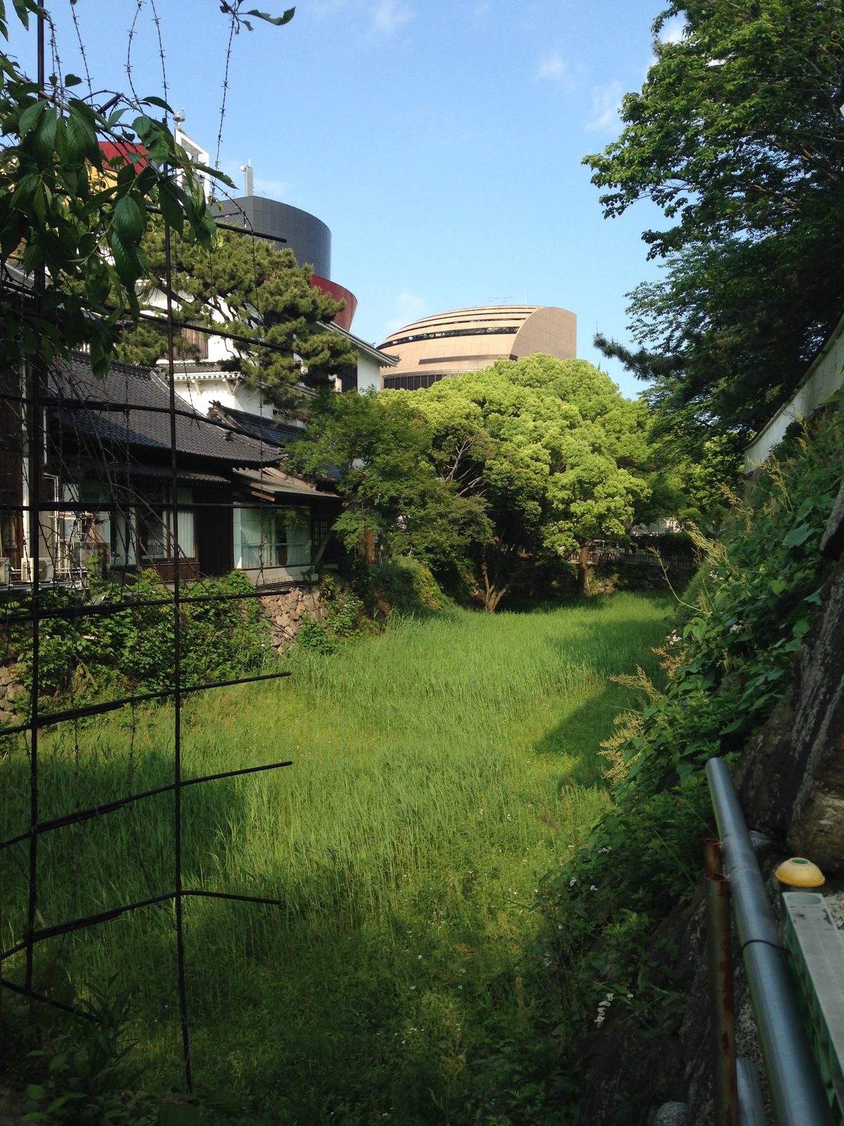 View of Kokura Castle moat and tower from Yasaka Shrine