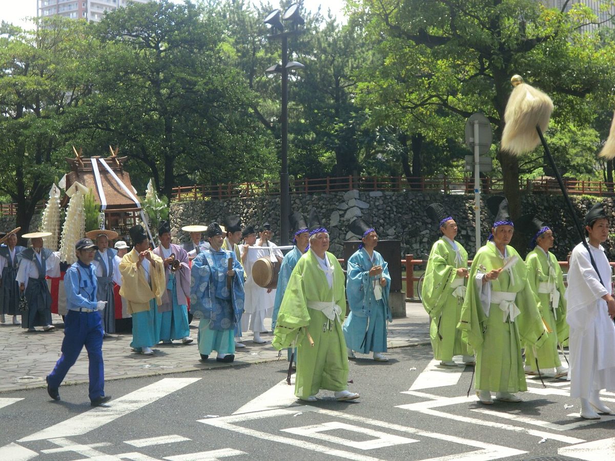 The Goshinkosai parade during Kokura Gion Daiko festival with decorated dashi carts
