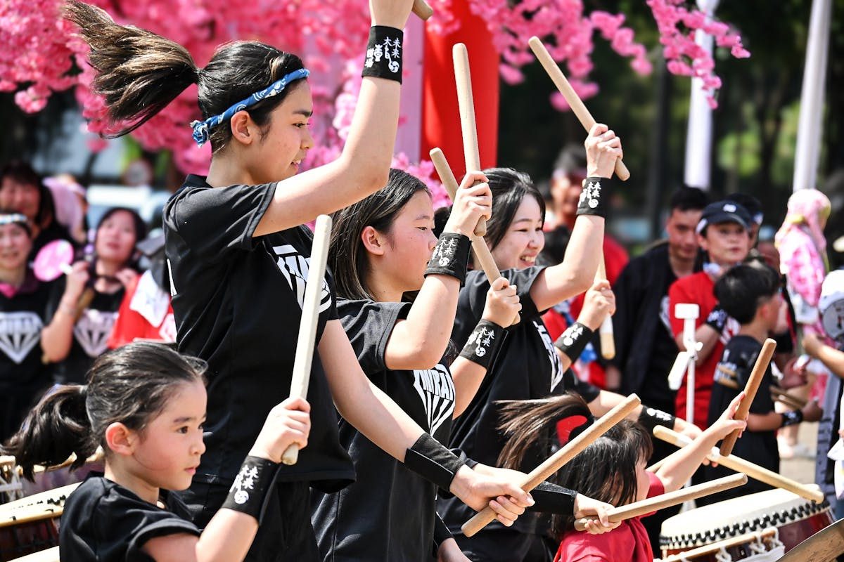 Taiko drummers performing at a Japanese cultural festival