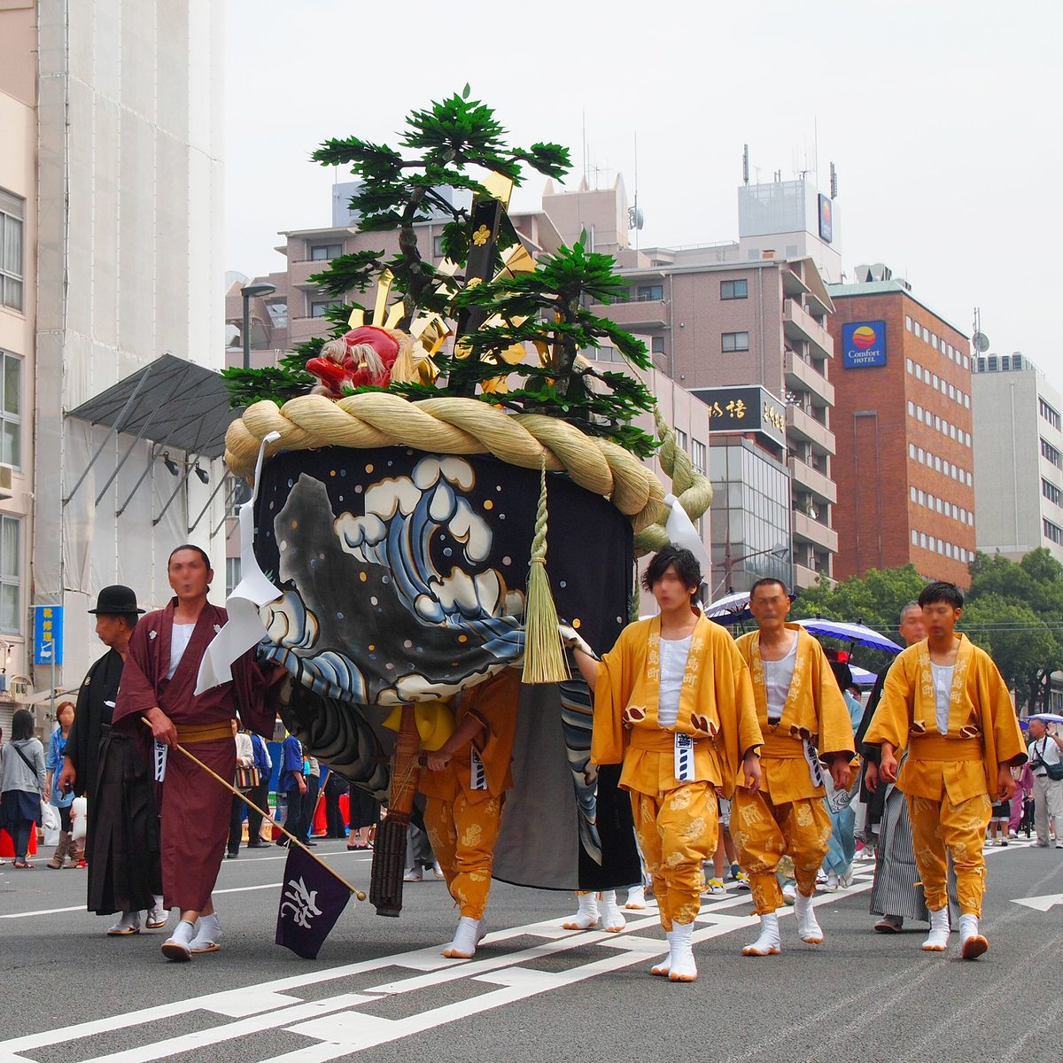 Kasaboko umbrella float decorated with ornaments at Nagasaki Kunchi