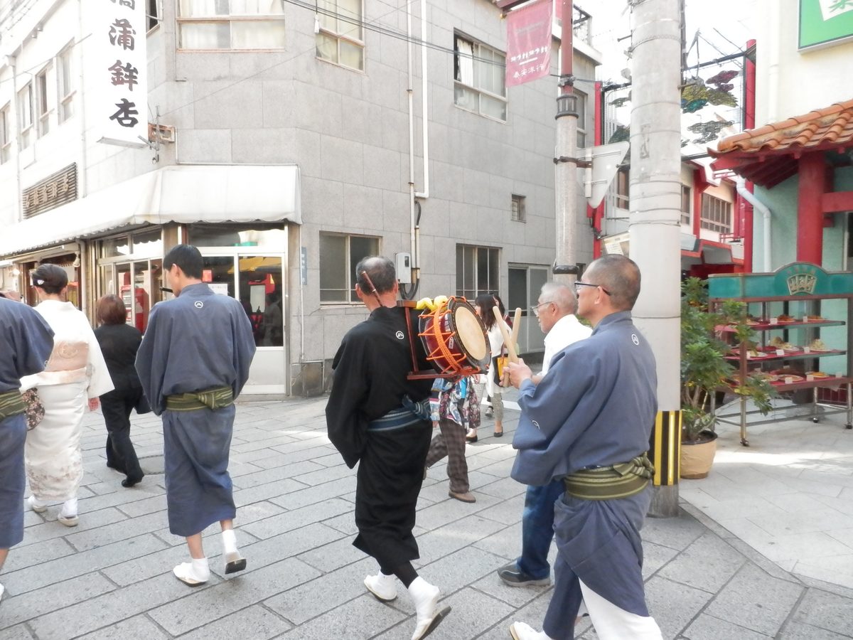 Shagiri musicians playing traditional instruments during Nagasaki Kunchi