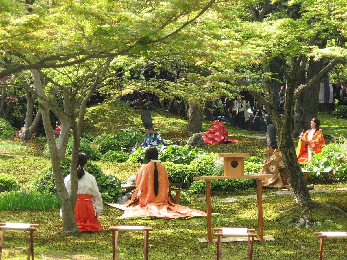 Poets in Heian-era court dress composing waka poems beside a meandering stream during the Kyokusui-no-en ceremony