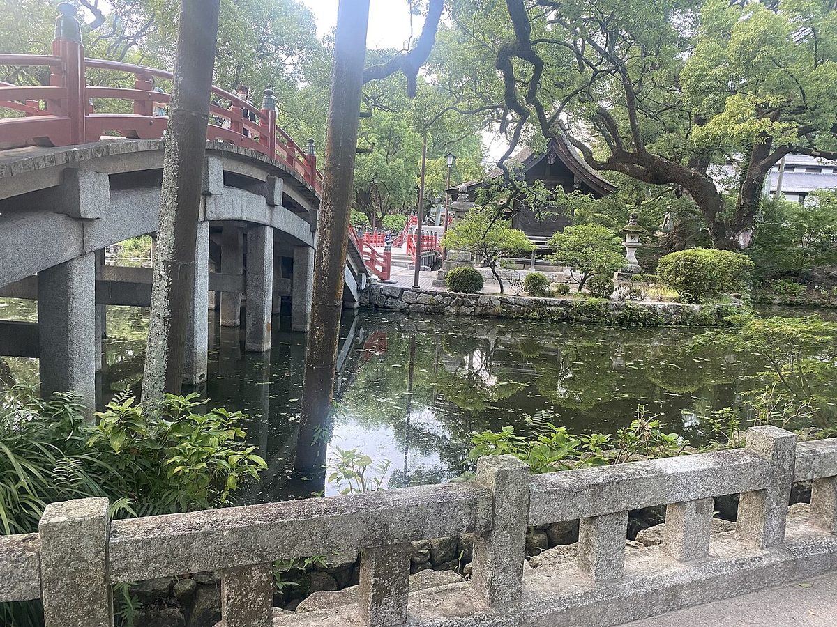 The arched bridge at Dazaifu Tenmangu shrine surrounded by trees