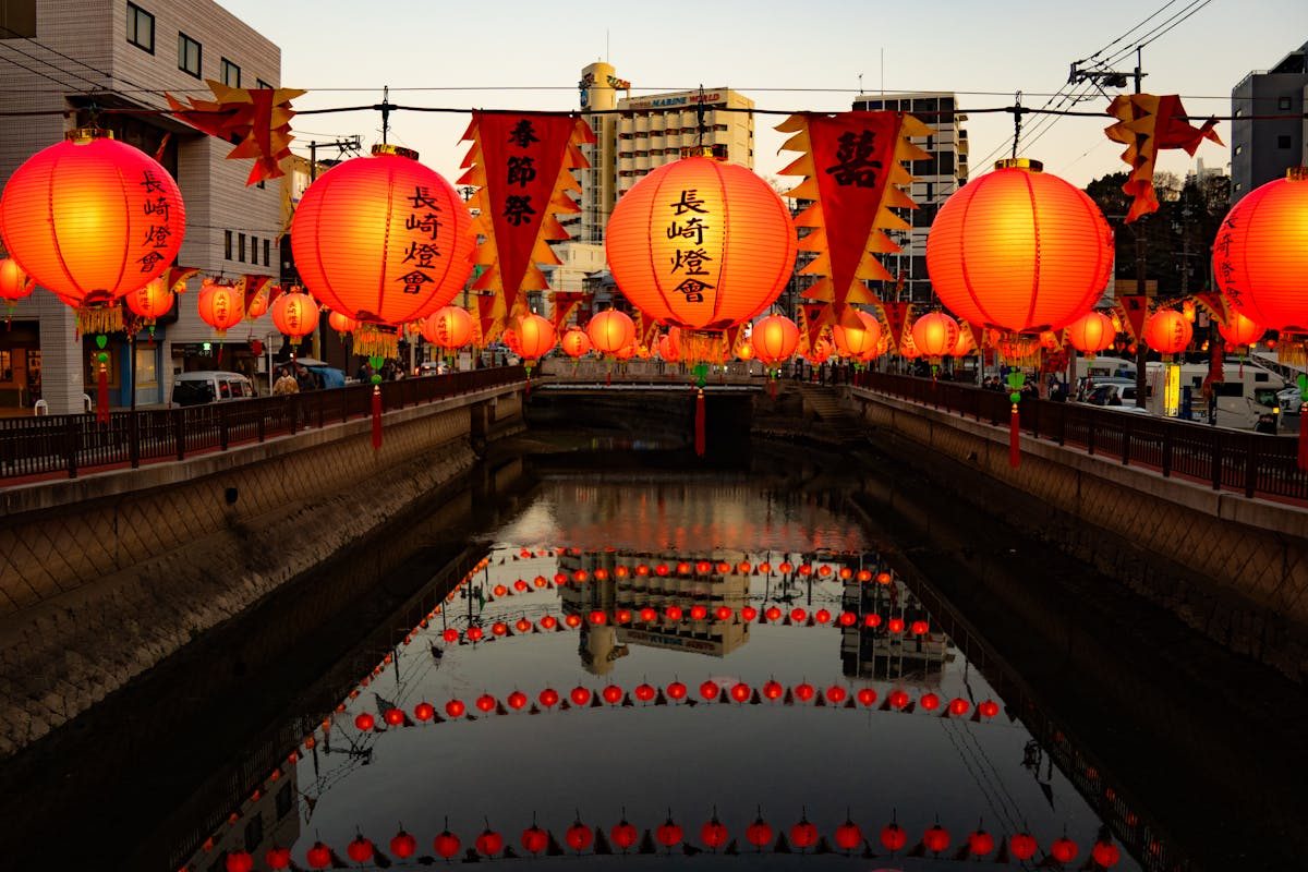 Lanterns reflecting in a Nagasaki canal during the Lantern Festival