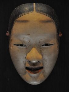 Zo-Onna Noh mask representing a young woman carved from Japanese cypress
