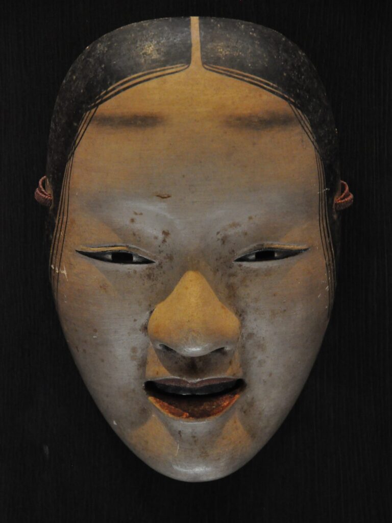Zo-Onna Noh mask representing a young woman carved from Japanese cypress