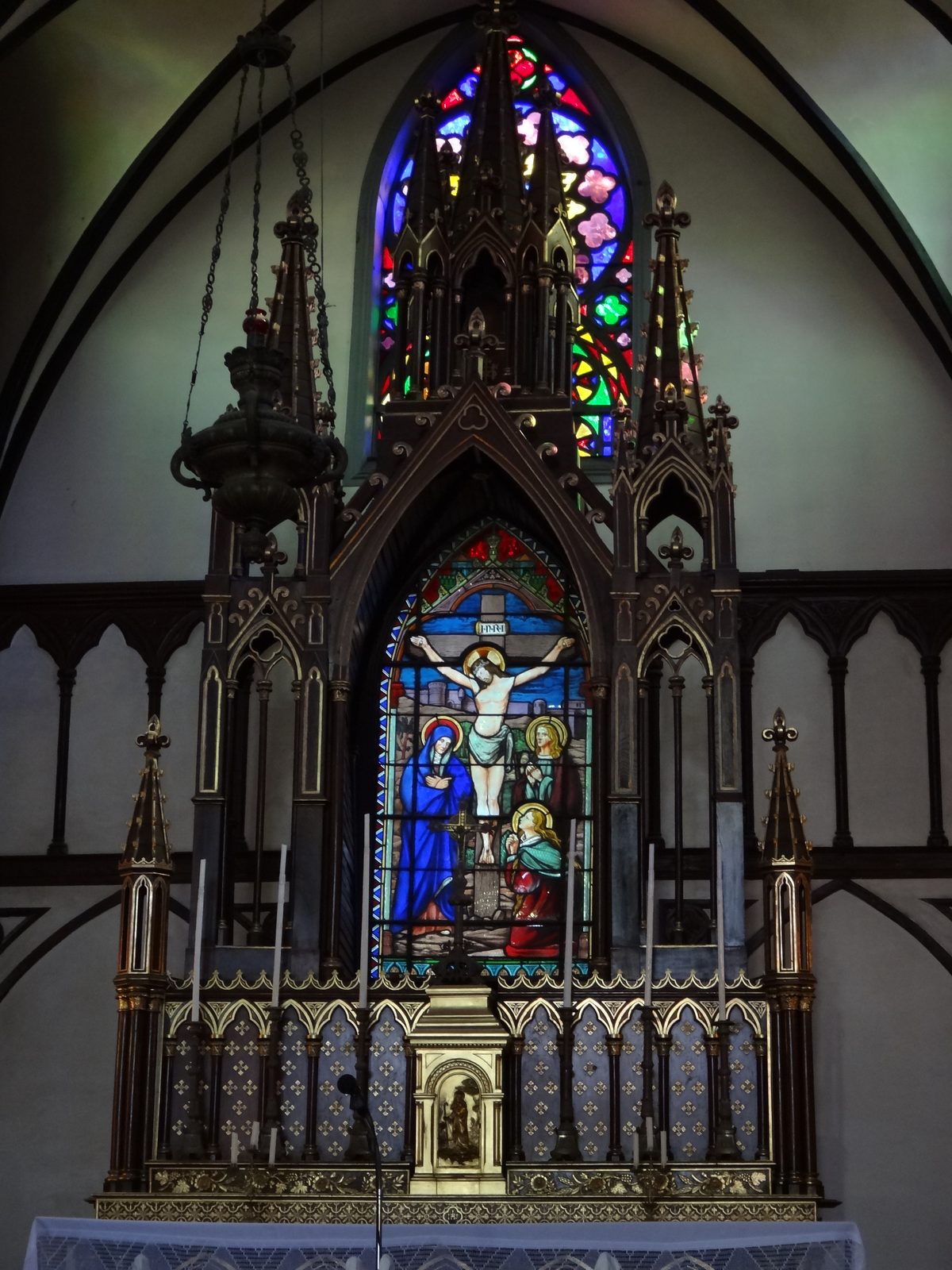 Golden altar and stained glass windows inside Oura Church Nagasaki