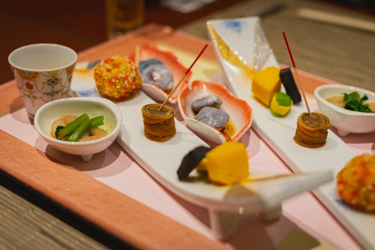 Traditional Japanese kaiseki multi-course meal beautifully arranged